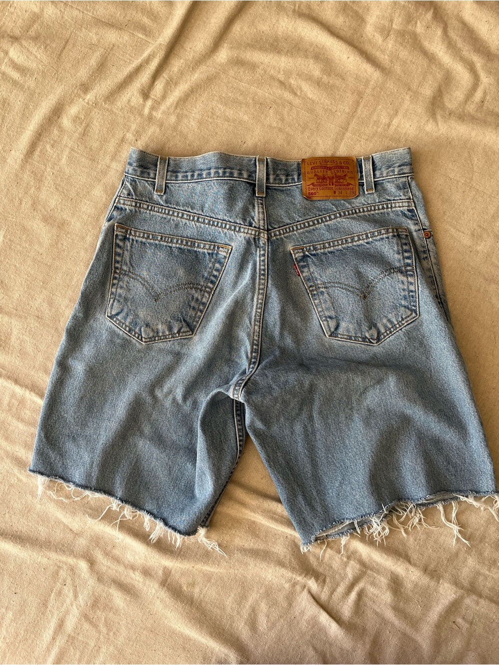 Vintage Levi’s 560 Cutoff Denim Shorts 34